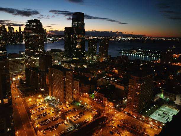 istock Illuminated Cityscape Against Sky At Dusk 707603529