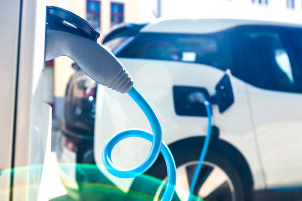 istock Electric Car At Charging Station 709208057