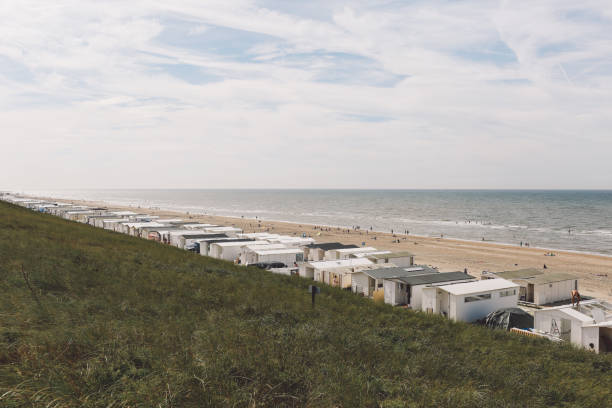 istock High Angle View Of Huts At Beach Seen From Grassy Cliff 709226213