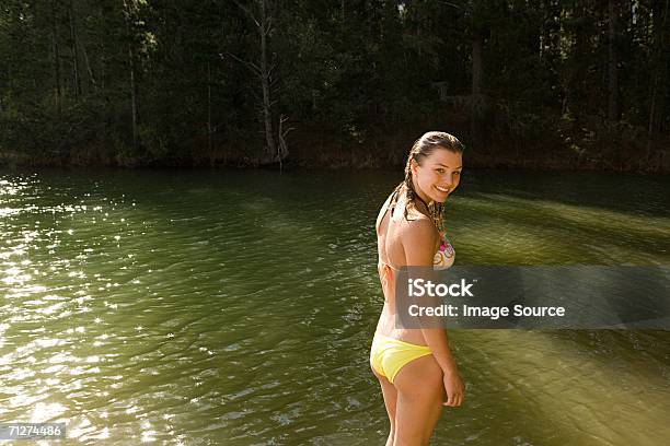 Young Woman By Lake Stock Photo - Download Image Now - Adult, Adults Only, Adventure