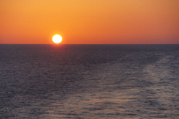 istock Scenic View Of Sea During Sunset 717297471
