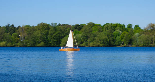 istock Boat Sailing In Sea 717318613