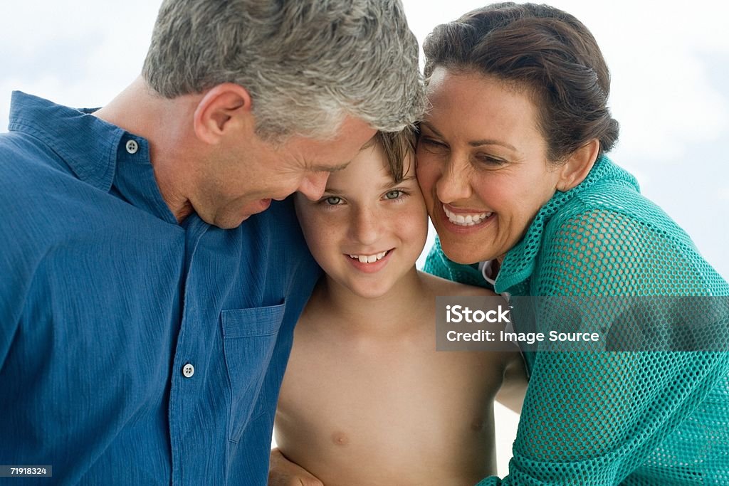 少年とご両親 - 3人のロイヤリティフリーストックフォト