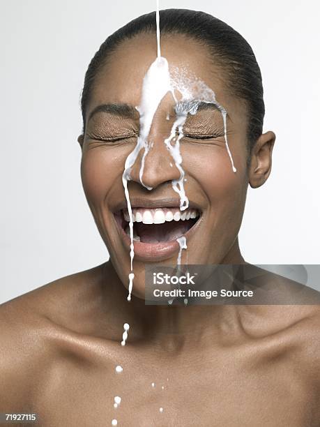 Milk Pouring Onto Woman Stock Photo - Download Image Now - Milk, Facial Expression, Moisturizer