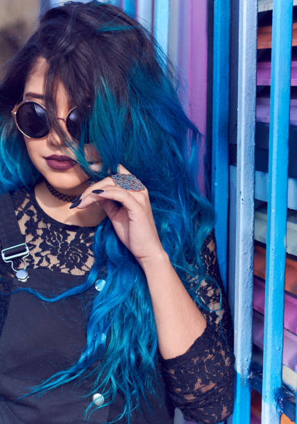 istock Young Woman With Multi Colored Hair 720075259