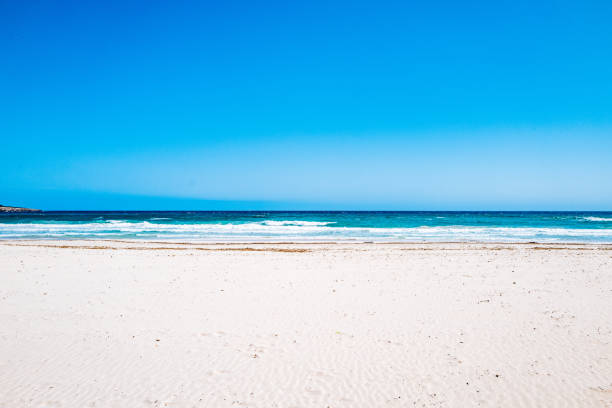 istock Scenic View Of Beach Against Clear Blue Sky 720145039