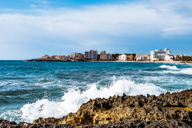 istock View Of City At Waterfront Against Cloudy Sky 720152343
