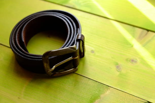 istock Belt On Green Wooden Table 722307203