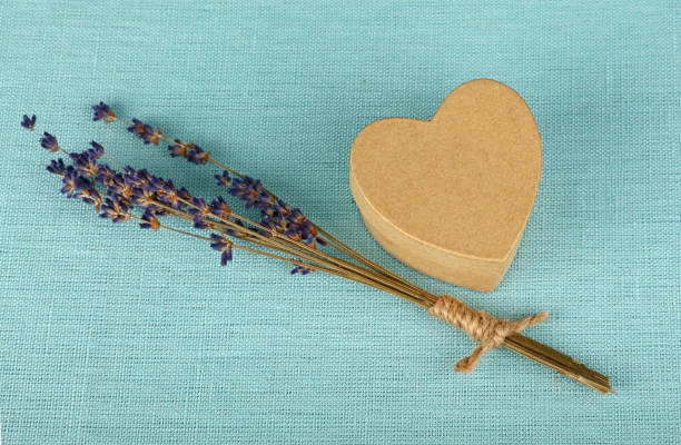 istock High Angle View Of Lavender With Heart Shaped Box On Blue Linen Canvas 722309543