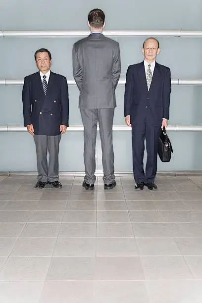 Photo of Three businessmen