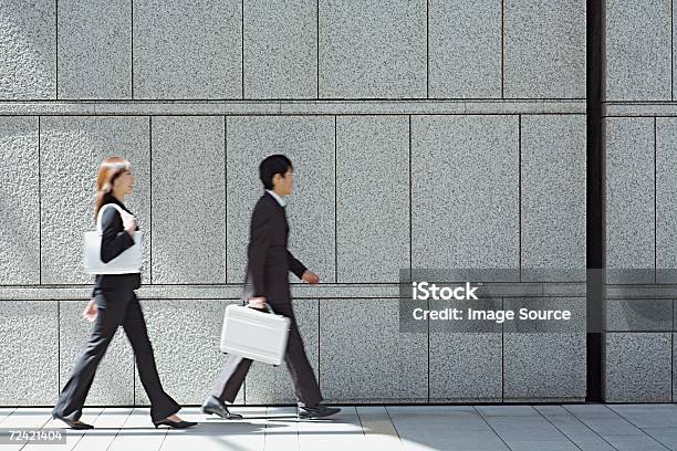 Businesspeople Walking Stock Photo - Download Image Now - Walking, People, Following - Moving Activity
