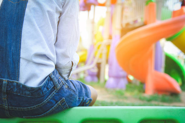 istock Mid Section Of Boy On Playground 724245751