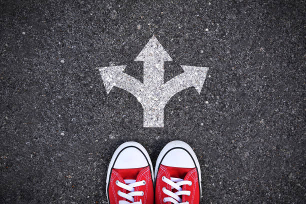 istock Low Section Of Man Standing On Road 724321657