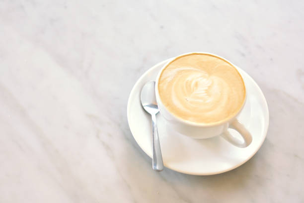 istock High Angle View Of Coffee Cup In Saucer On Marble 726853685