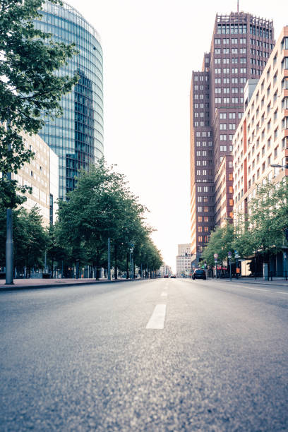 istock Empty Road Amidst Buildings In City 726854069