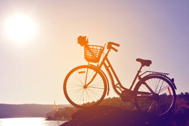 istock Bicycle Parked On Rock Against Sky 726882443