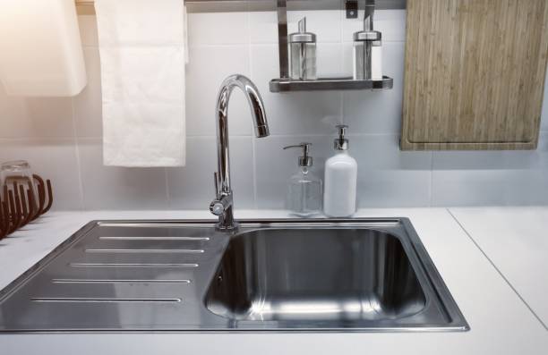 istock Close-Up Of Faucet In Kitchen 726893851