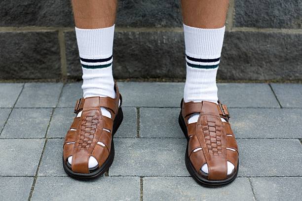 Man wearing sandals  sandal stock pictures, royalty-free photos & images