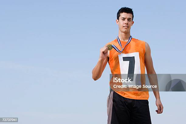 Atleta Galardonado Foto de stock y más banco de imágenes de Varón - Varón, Maratón, Medalla