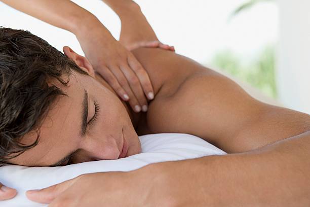Man having a massage  man massage stock pictures, royalty-free photos & images