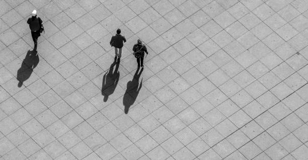 istock High Angle View Of People On Walkway During Sunny Day 728870569
