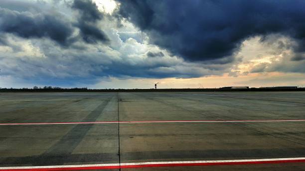 istock Airplane On Runway Against Sky 728919483