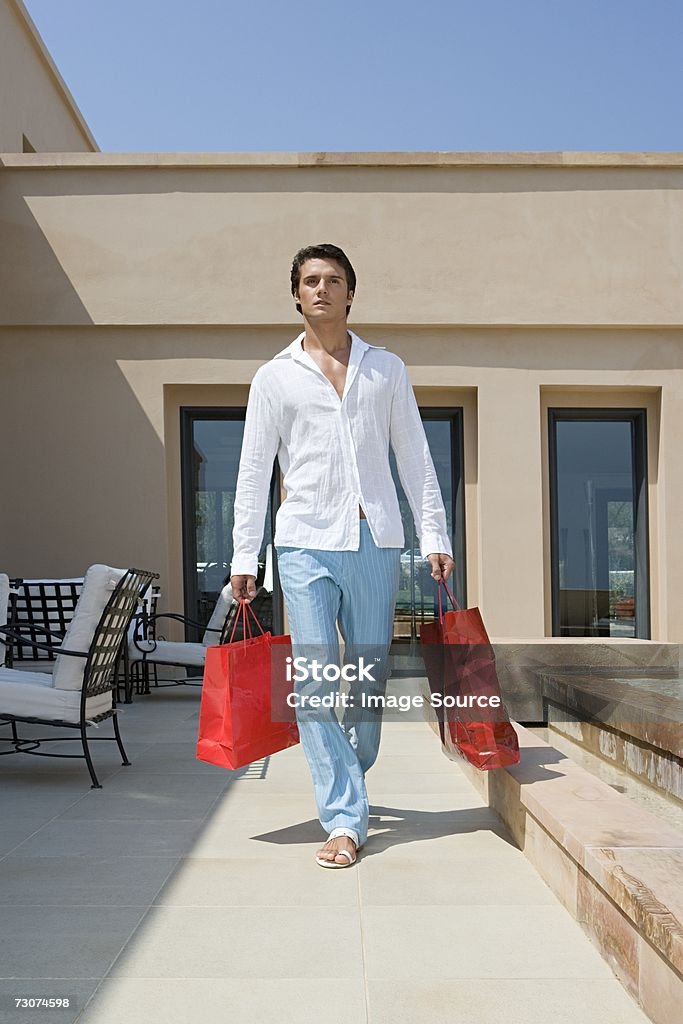 Man with shopping bags  Men Stock Photo