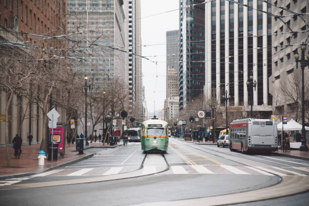 istock Tram On Track Amidst Buildings In City 731858913