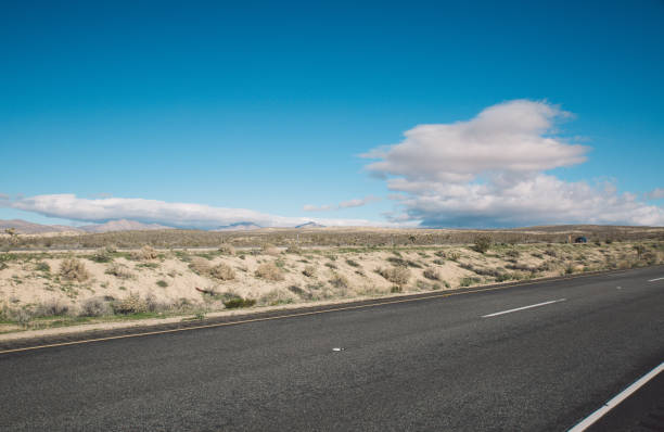 istock Road By Landscape Against Blue Sky 733472967