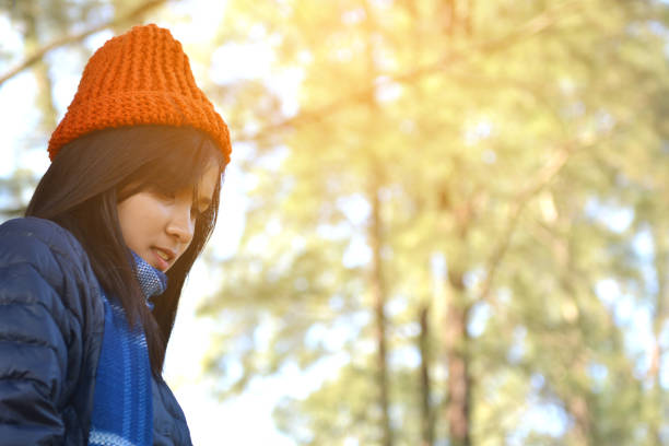istock Side View Of Woman Wearing Knit Hat 733474665