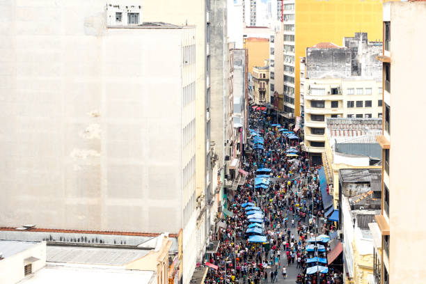 istock Crowd Of People In City 733478159