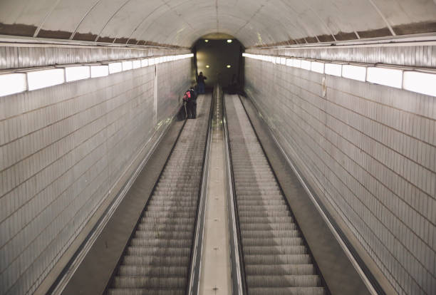 istock High Angle View Of Illuminated Escalator In Subway Station 733481347