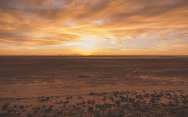 istock Scenic View Of Desert Against Sky During Sunset 733605173