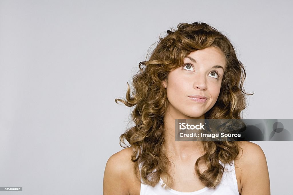Confused looking woman  Women Stock Photo