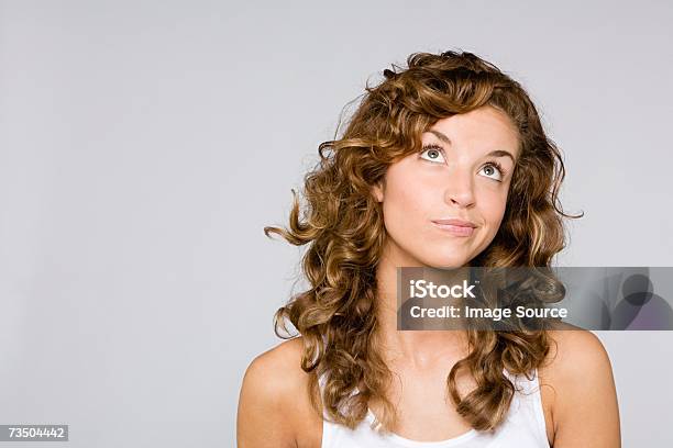 Confused Looking Woman Stock Photo - Download Image Now - Women, One Woman Only, Uncertainty