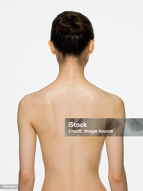 Rear View Of A Young Woman Stock Photo - Download Image Now - Rear View, Women, Naked