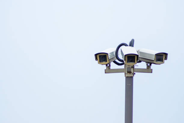istock Low Angle View Of Security Cameras Against Clear Sky 735963225