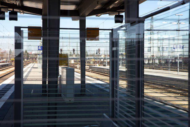 istock Railroad Station Platform Seen Through Glass 735963227