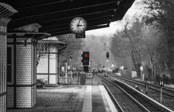 The retro and modern railway station in Krakow by night , Poland
