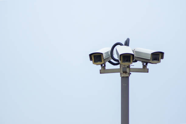 istock Low Angle View Of Security Cameras Against Clear Sky 735965325