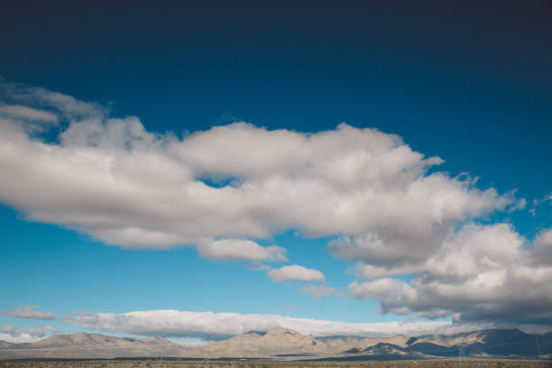 istock Scenic View Of Landscape Against Blue Sky 736023603
