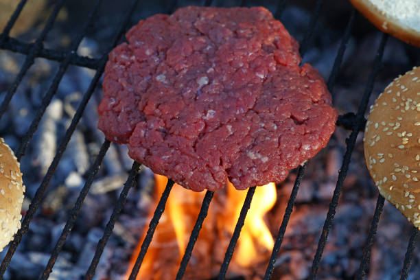 istock High Angle View Of Meat On Barbecue Grill 736511715
