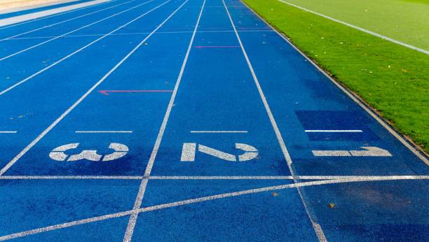 istock High Angle View Of Numbers On Blue Running Track 736512901