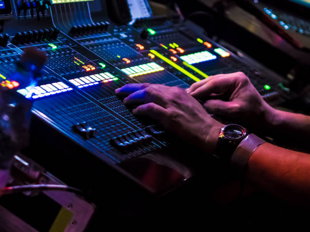 istock Cropped Hands Of Male Dj Using Control Panel During Music Concert 736516699