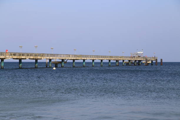 istock View Of Bridge Over Sea Against Clear Sky 736534351