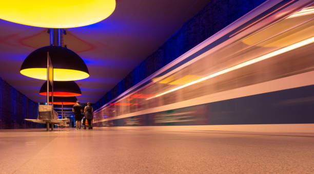 istock Blurred Motion Of Train At Illuminated Subway Station 736836519