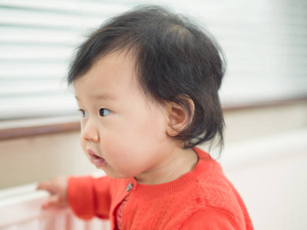 istock Close-Up Of Boy By Window At Home 739276291