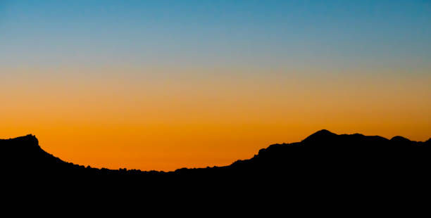 istock Silhouette Landscape Against Clear Sky During Sunset 739306029