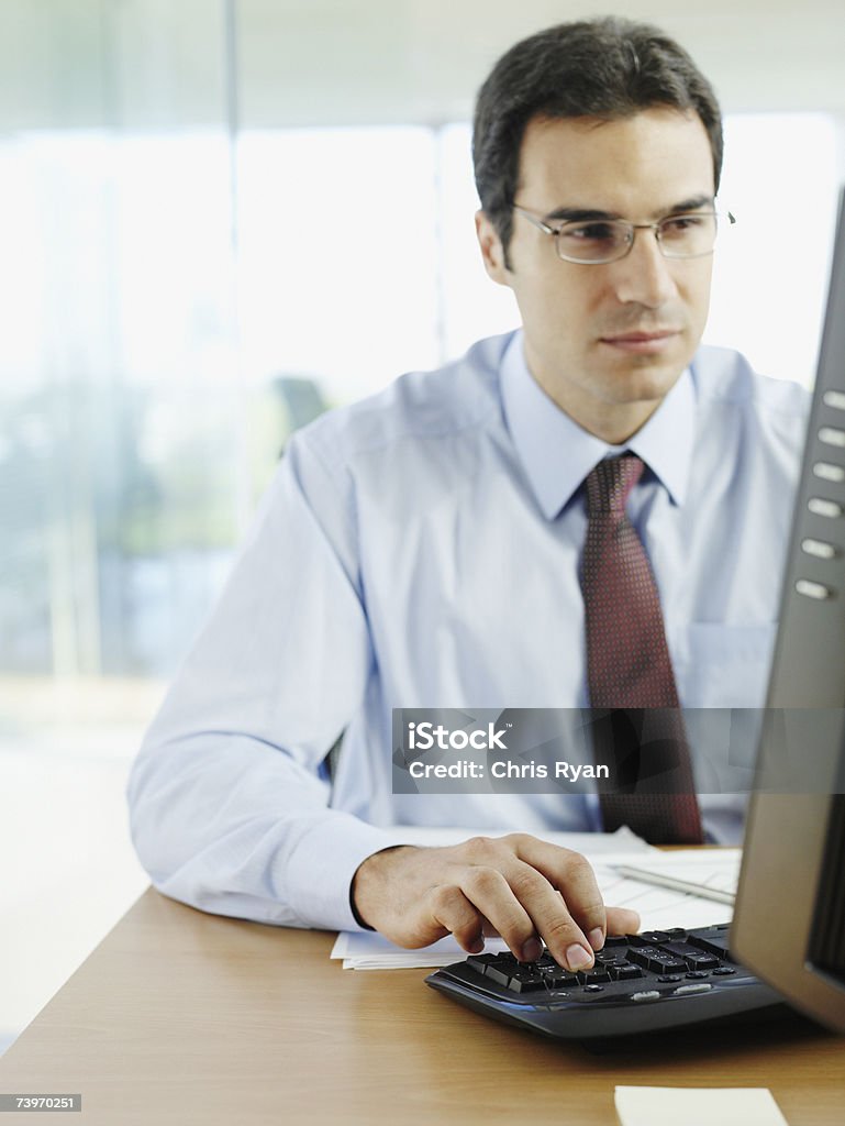 Man in office working on personal computer  30-34 Years Stock Photo