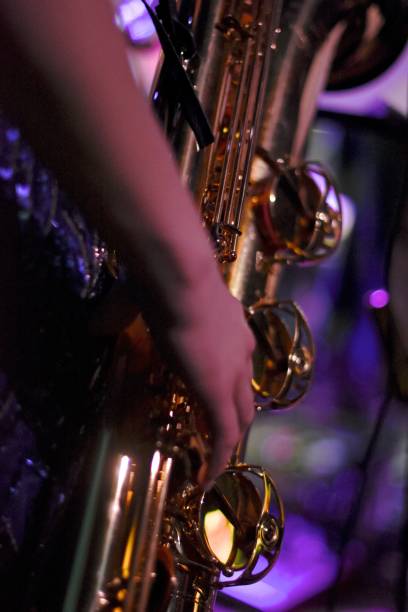 istock Close-Up Of Hand Playing Saxophone 740627269